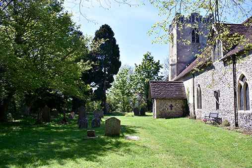 The parish church and churchyard next to the Hall